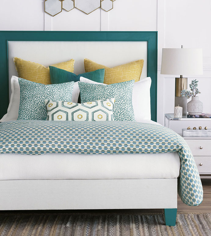 Decorating Den Interiors offer custom painted or upholstered headboards, ottomans and stools.
