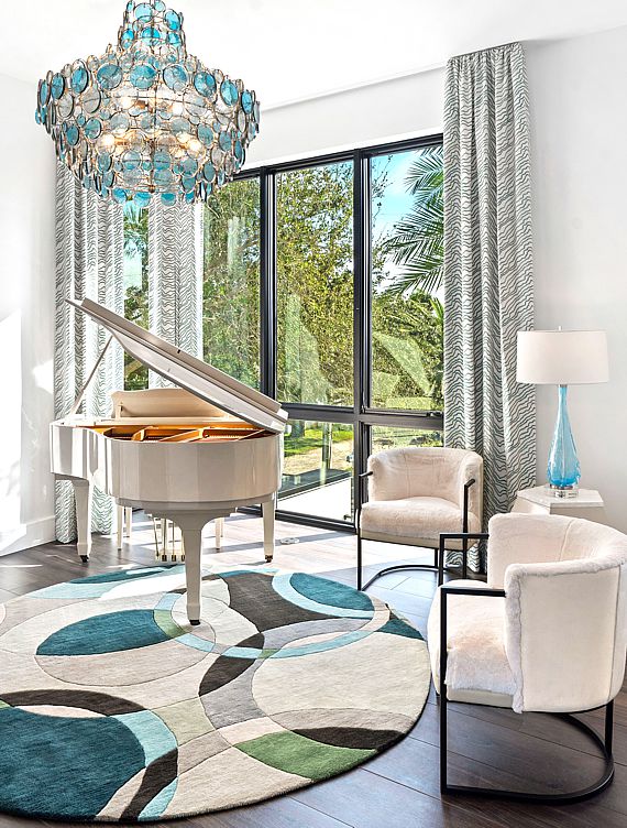 This music room with the client's family piano takes center stage in this Florida living space.