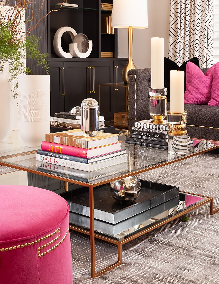 The size of your living room and the seating arrangement dictate the dimensions of your coffee table. 