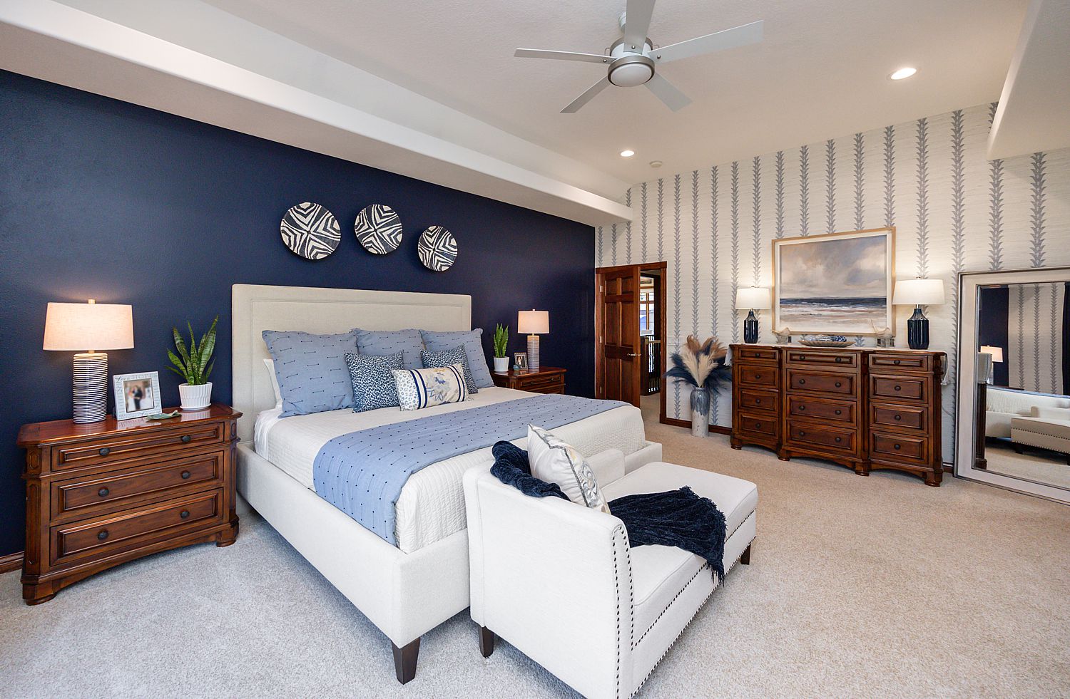 Stylish bedroom storage with dresser, bedside cabinets and functional furniture.
