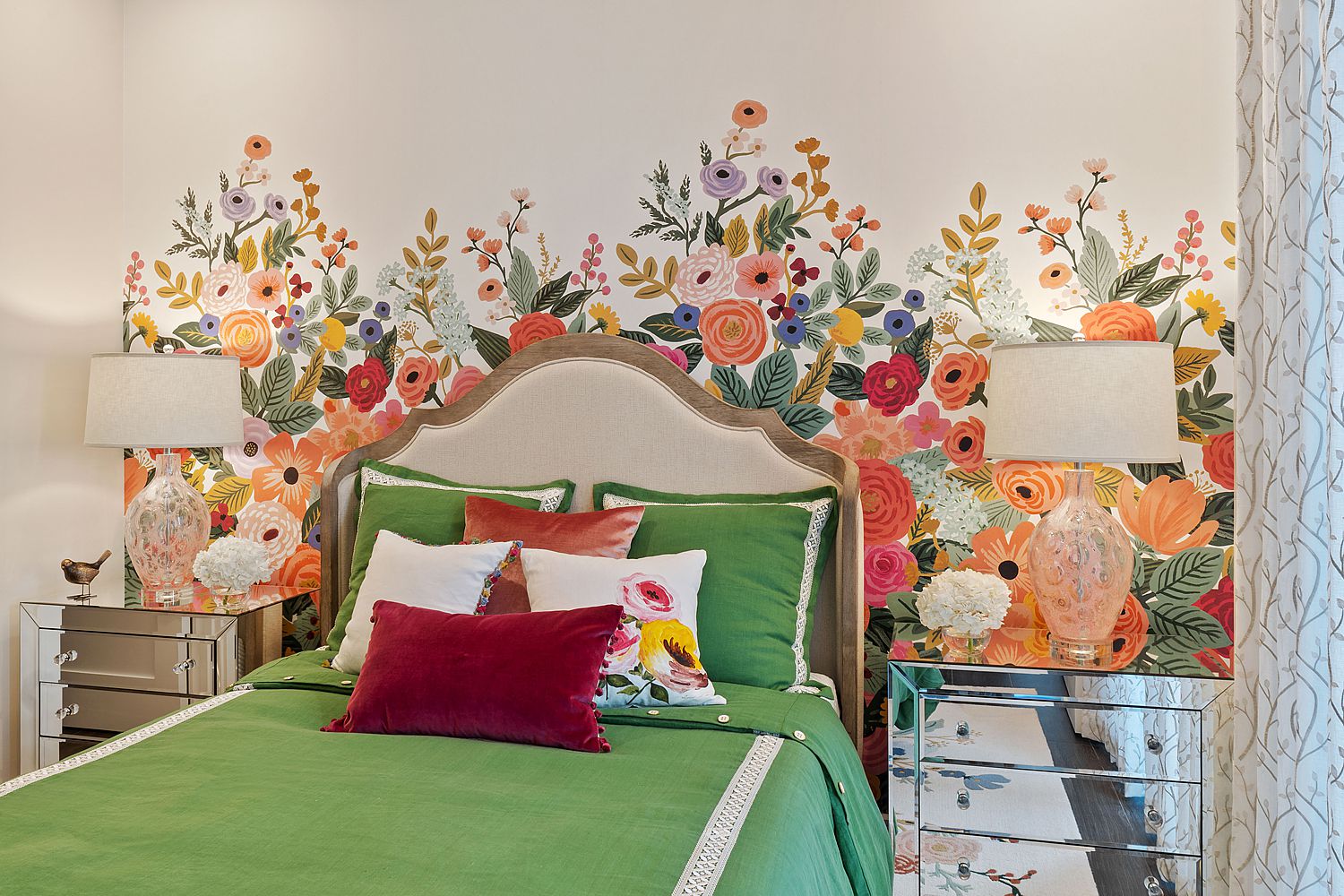 Welcoming guest bedroom with comfortable bedding and bedside lighting.
